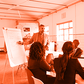 team leader represents aplan in meeting board