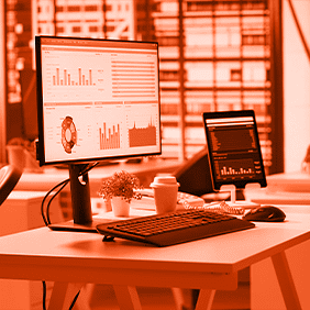 Modern office workspace displaying Mazaya Automator dashboard on screen - integrated business process automation system